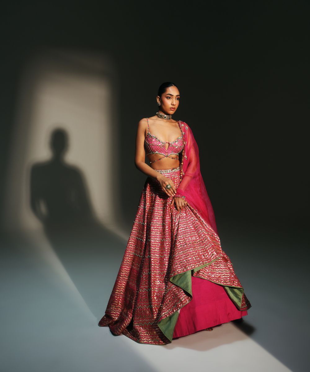 KOMAL- HEAVY HAND EMBROIDERED RANI PINK KALI LEHENGA - Mehfil by Mahima Mahajan