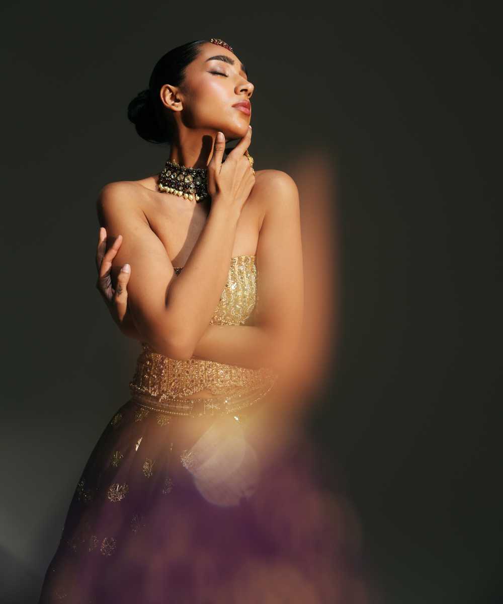 BINDIYA - HAND EMBROIERED BOOTI LEHENGA WITH GOLDEN CORSET AND DUPATTA- Mehfil by Mahima Mahajan