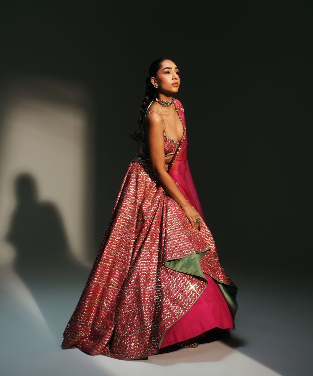 KOMAL- HEAVY HAND EMBROIDERED RANI PINK KALI LEHENGA - Mehfil by Mahima Mahajan