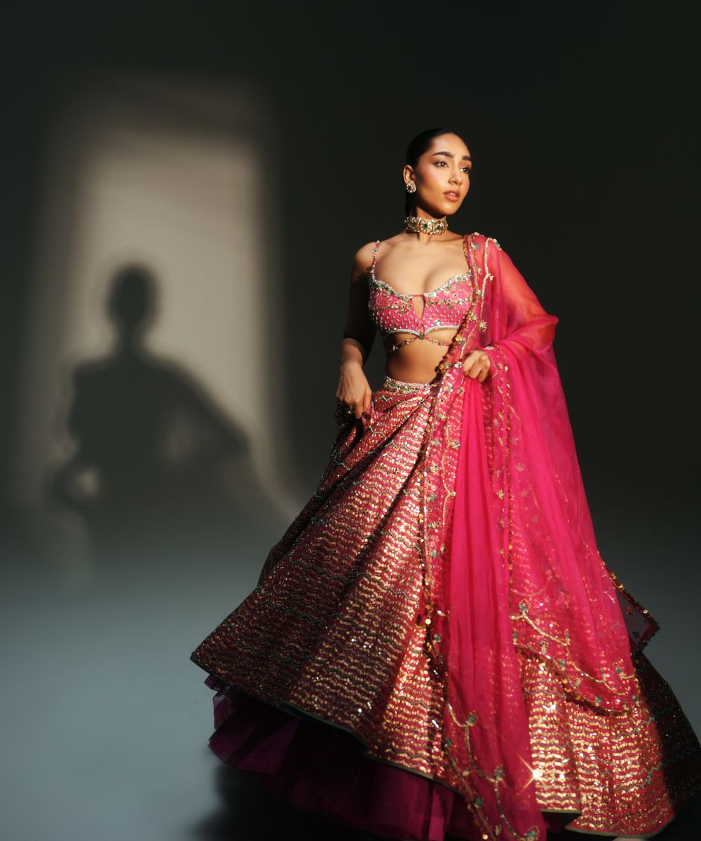 KOMAL- HEAVY HAND EMBROIDERED RANI PINK KALI LEHENGA - Mehfil by Mahima Mahajan