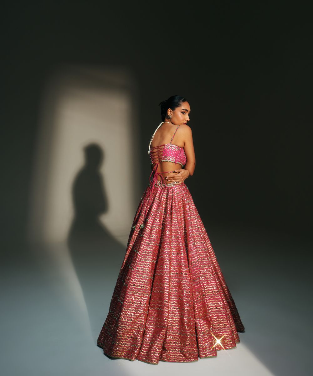 KOMAL- HEAVY HAND EMBROIDERED RANI PINK KALI LEHENGA - Mehfil by Mahima Mahajan
