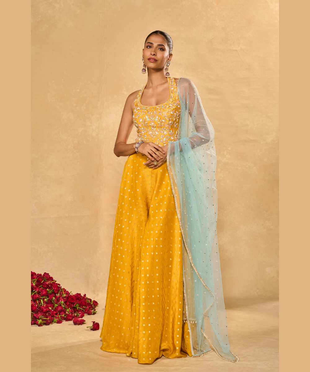 RIZ WITH TISSUE PANTS - Woven flared pant paired with a raw silk halter corset blouse -  Leher by Chamee and Palak