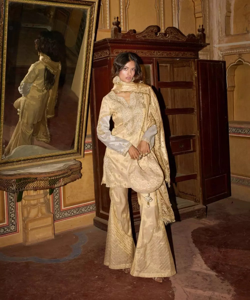 Aditi Gupta - Champagne Gold short Kurta with Bell Bottom Pants with Hot pink dupatta