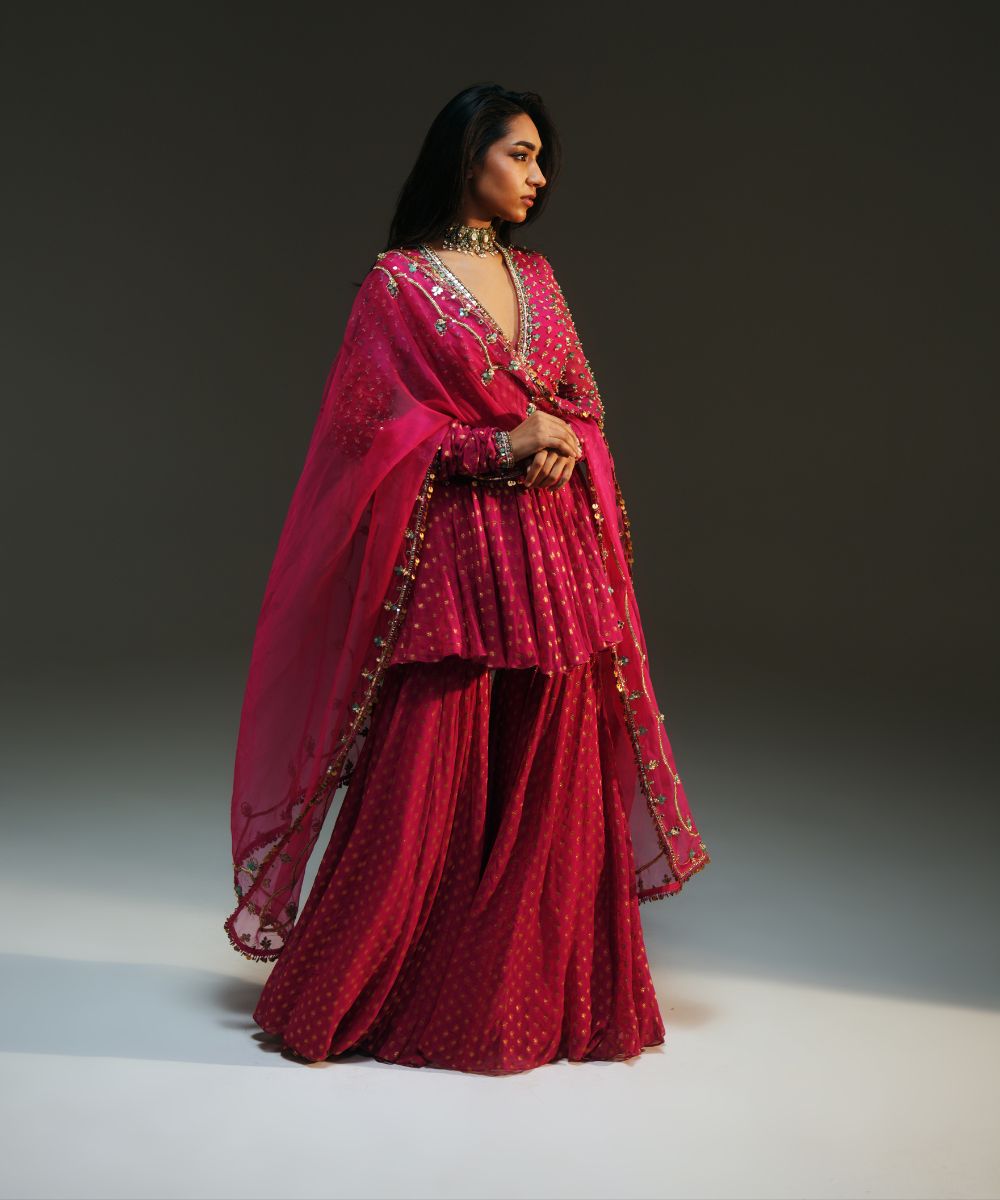 NIDHI - HAND EMBROIDERED RANI PINK SHORT KURTA AND SHARARA PAIRED WITH DUPATTA - Mehfil by Mahima Mahajan