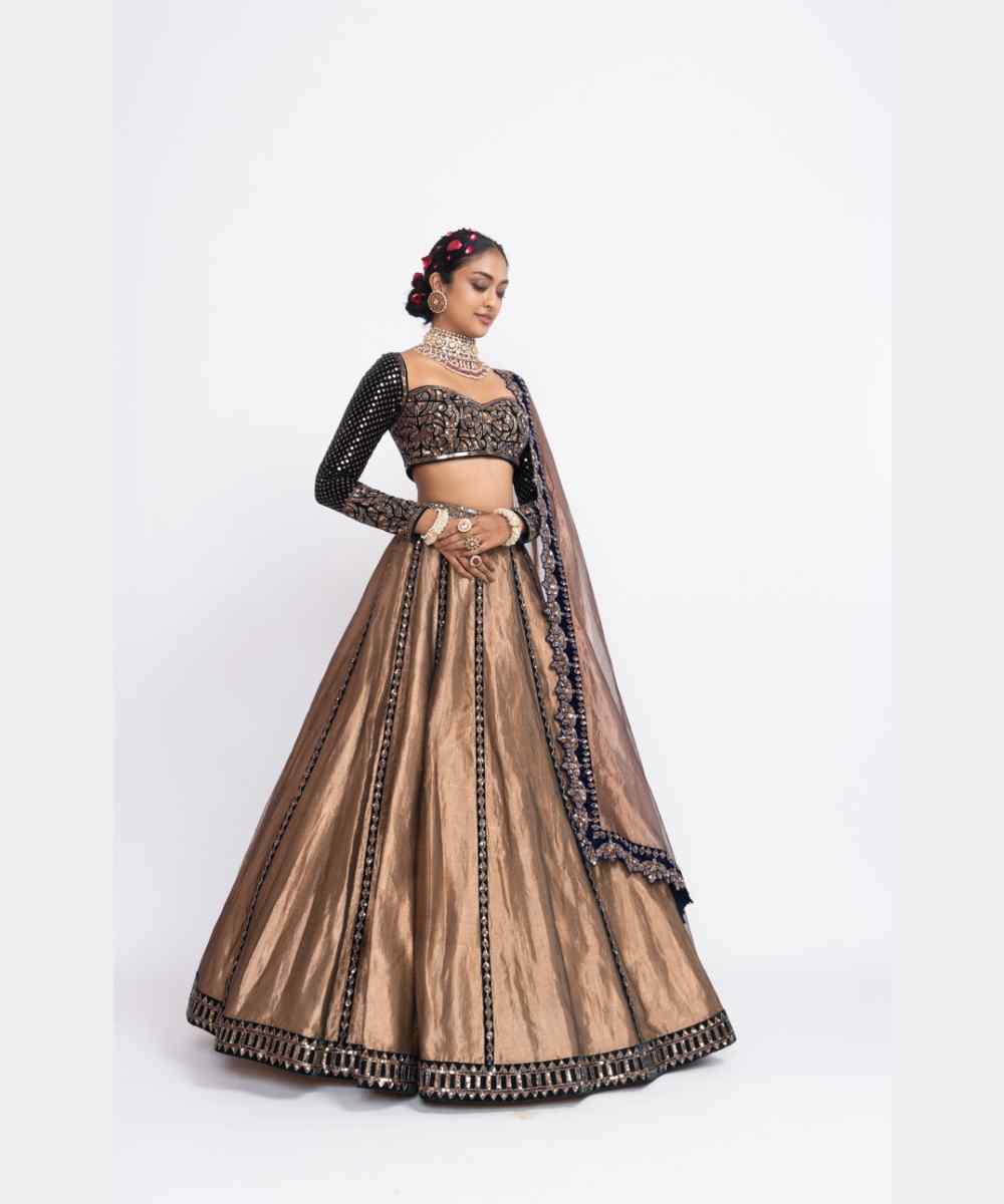 Deep green copper tissue lehenga set