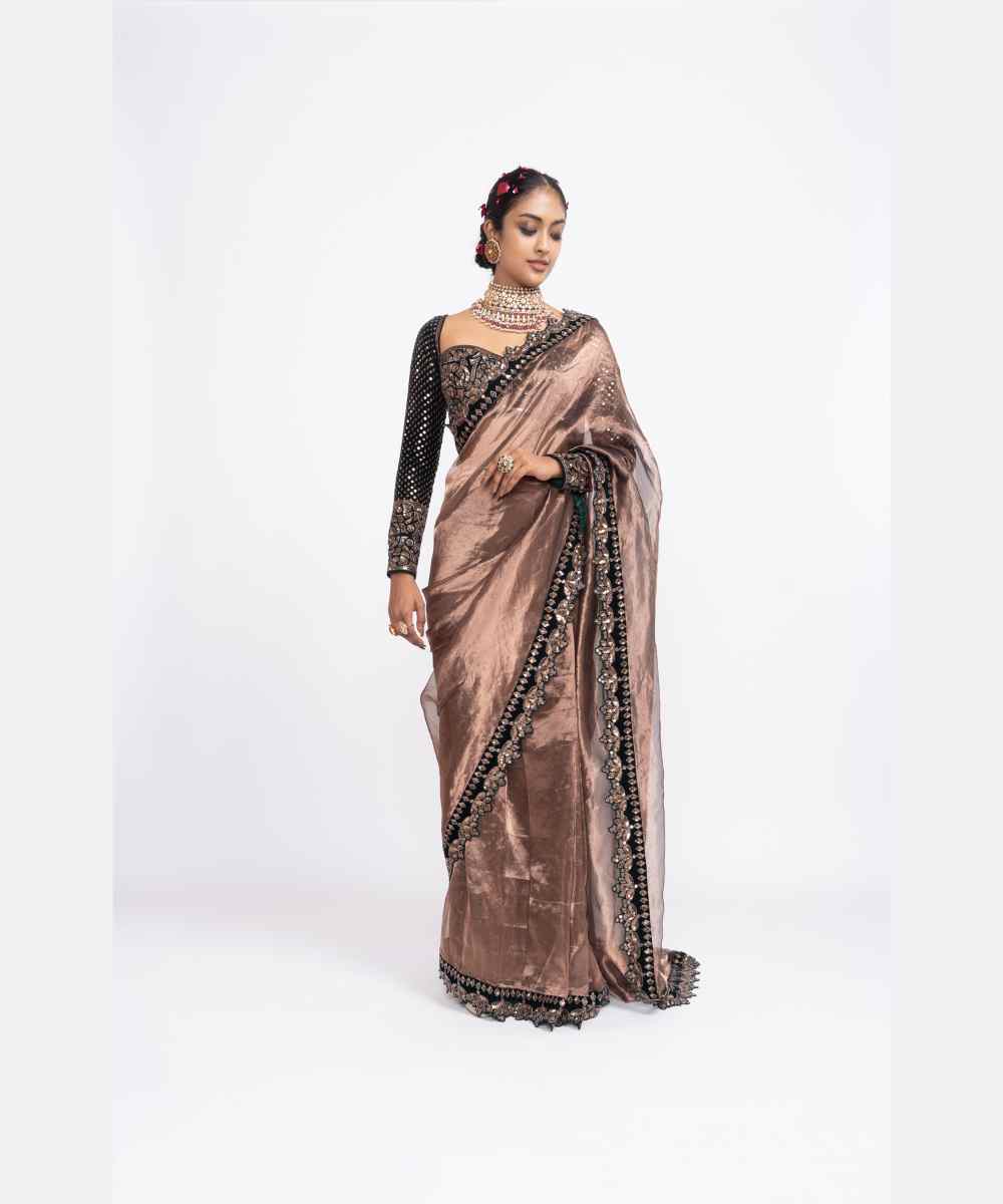 Deep green copper tissue saree set