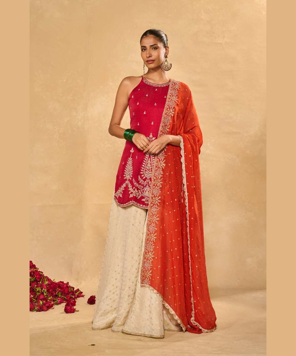 AMBI  SHARARA - Soft silk halter kurta paired with an ivory tissue Jamawar flared pant - Leher by Chamee and Palak