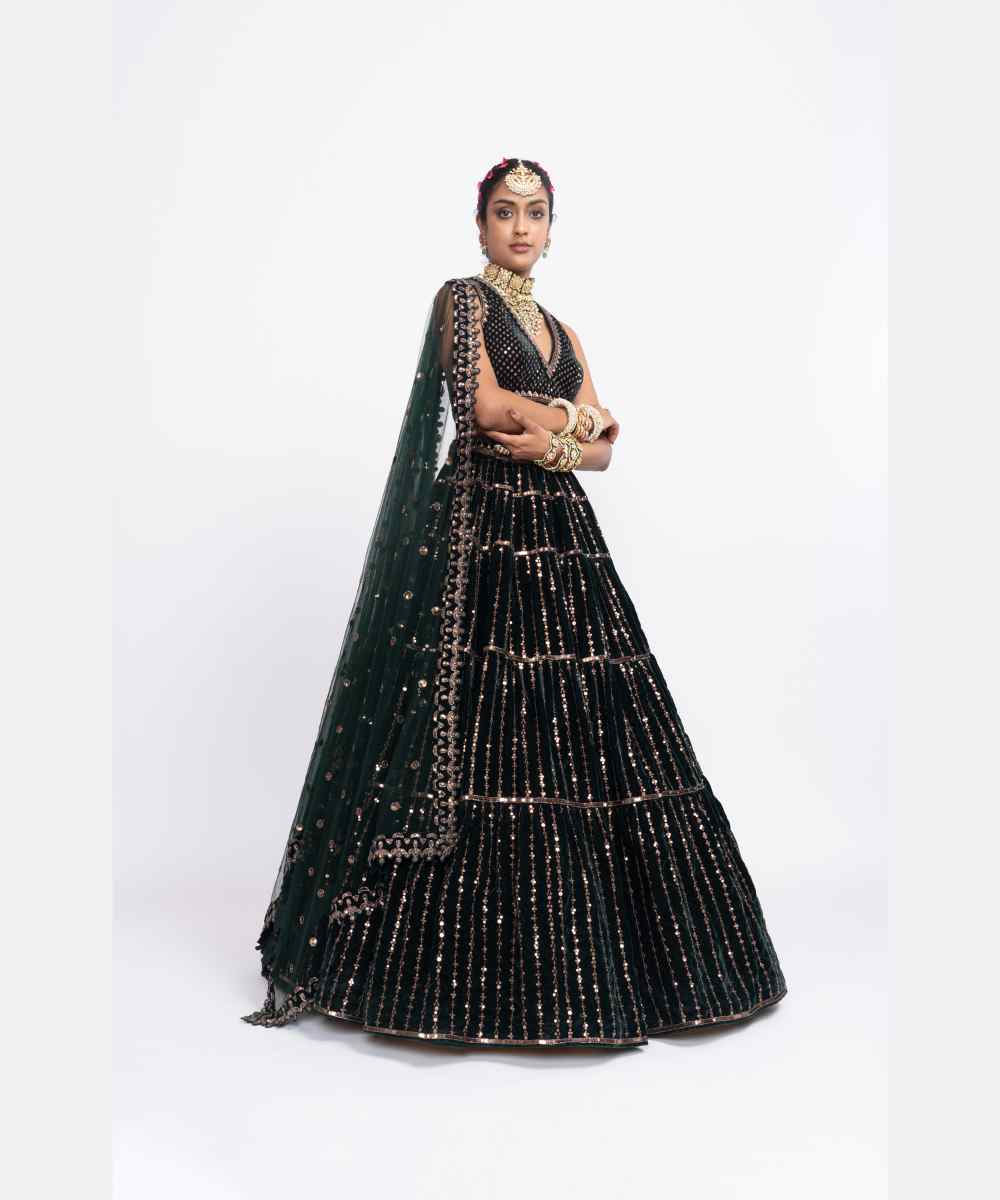 Deep green full tier lehenga set