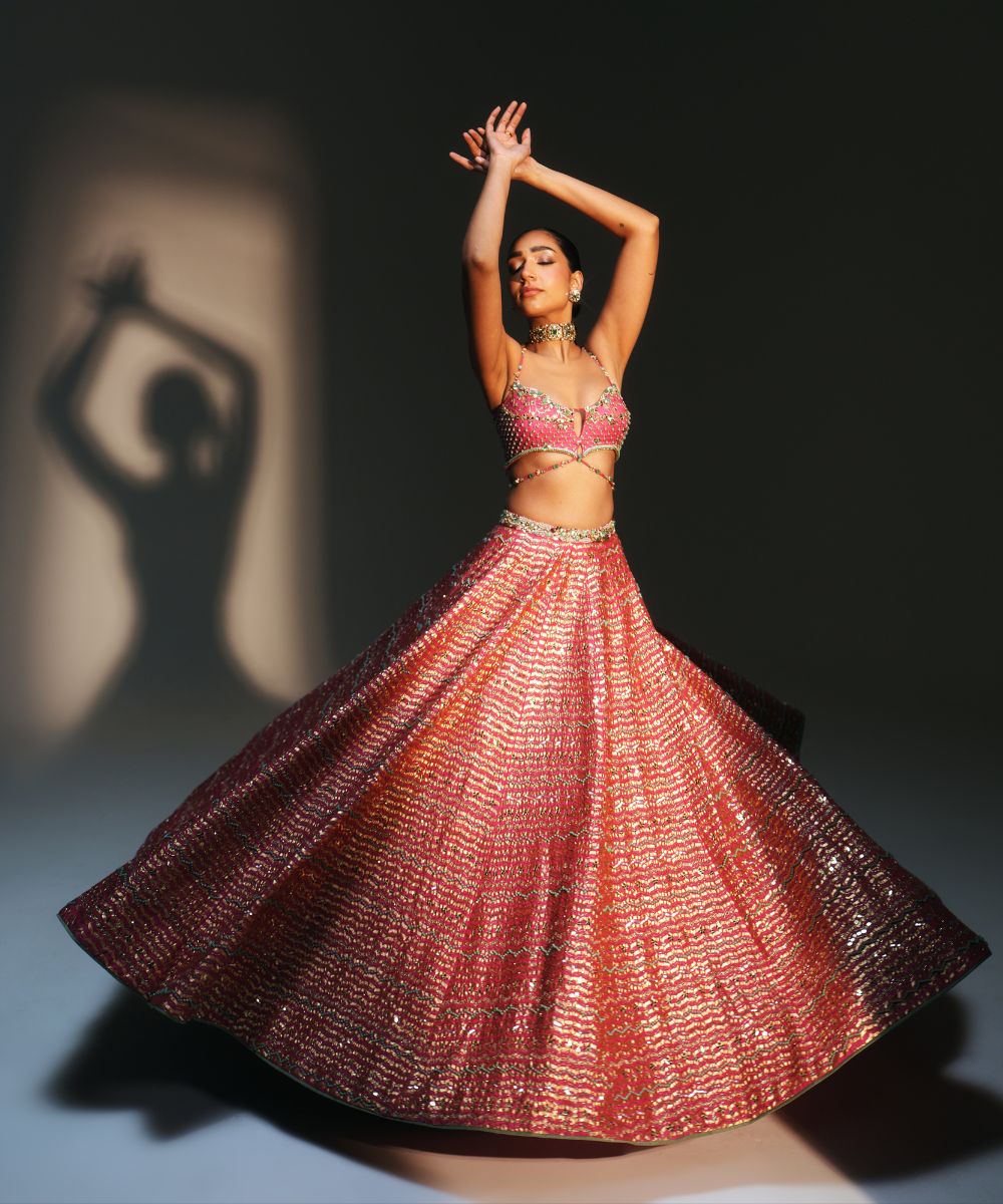 KOMAL- HEAVY HAND EMBROIDERED RANI PINK KALI LEHENGA - Mehfil by Mahima Mahajan