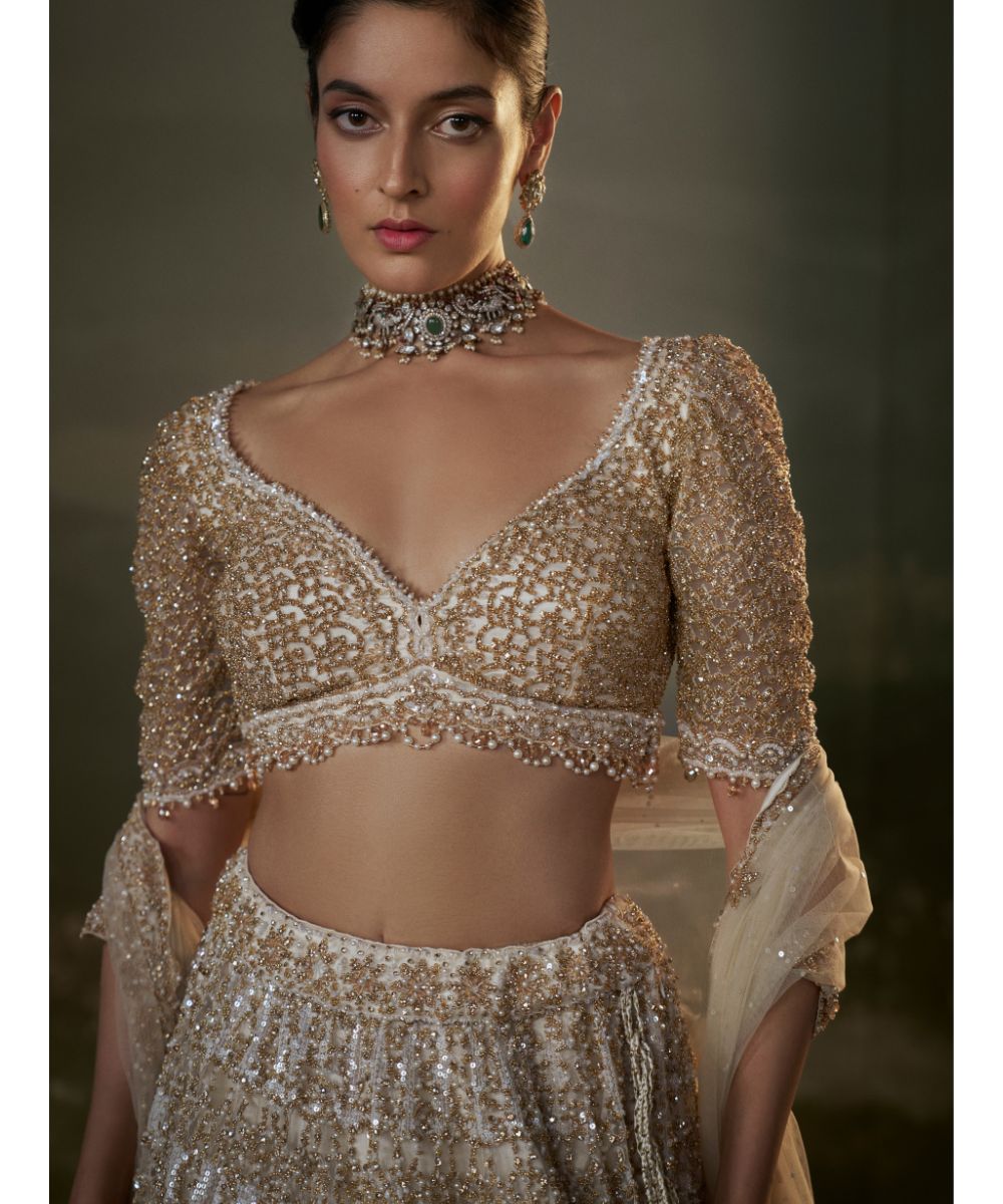 NITIKA GUJRAL - Ivory And Gold Lehenga Choli Set