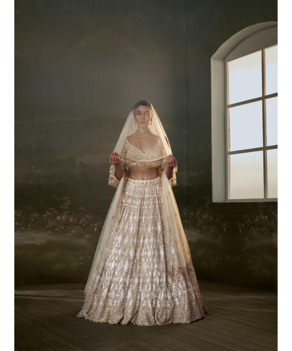 NITIKA GUJRAL - Ivory And Gold Lehenga Choli Set