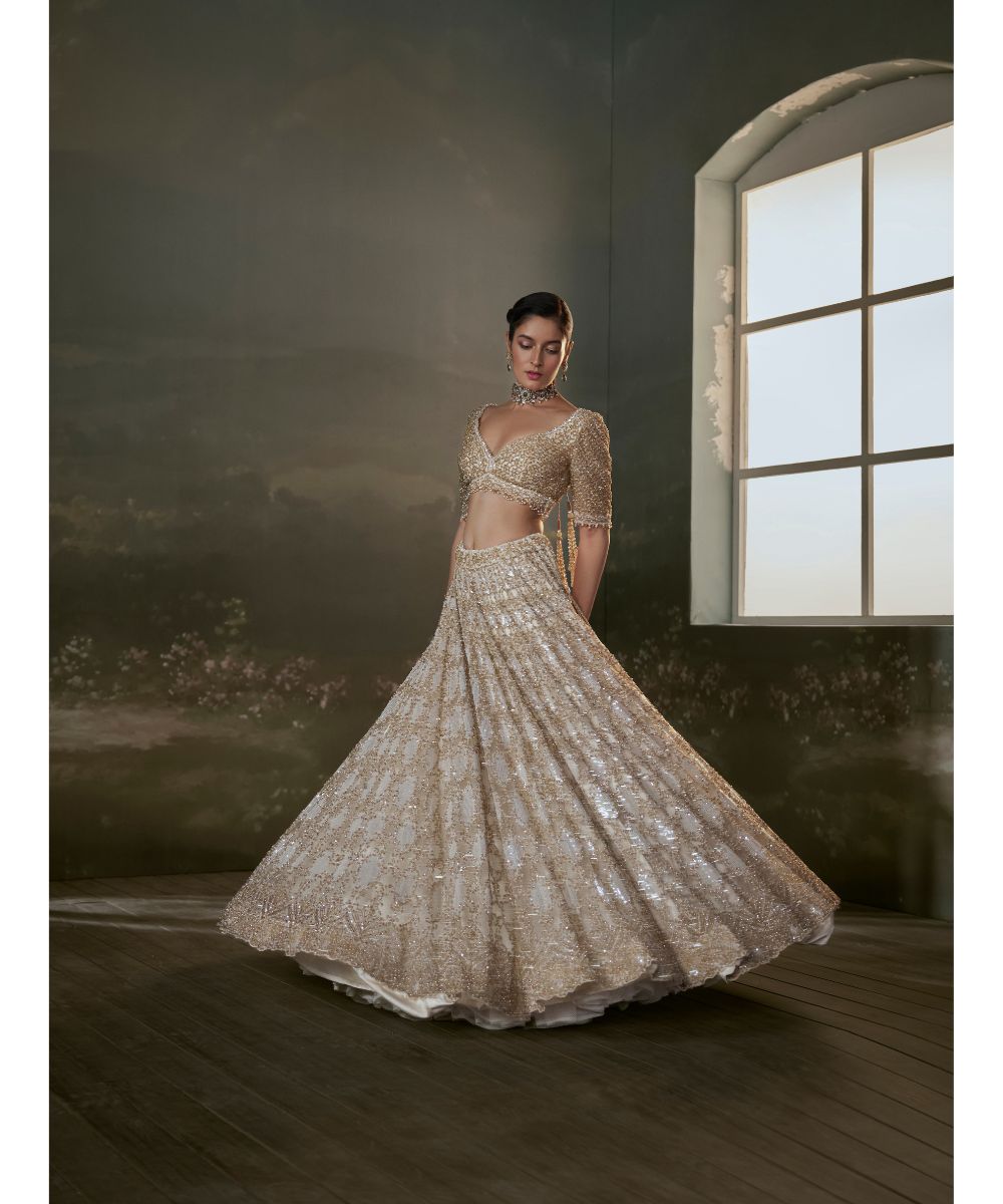 NITIKA GUJRAL - Ivory And Gold Lehenga Choli Set