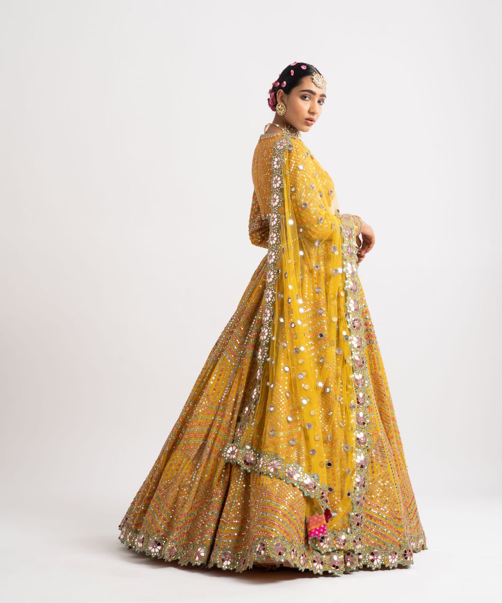 Yellow V Neck Heavy Multi Color Lehenga Set - Collection name Rang by Vvani vats