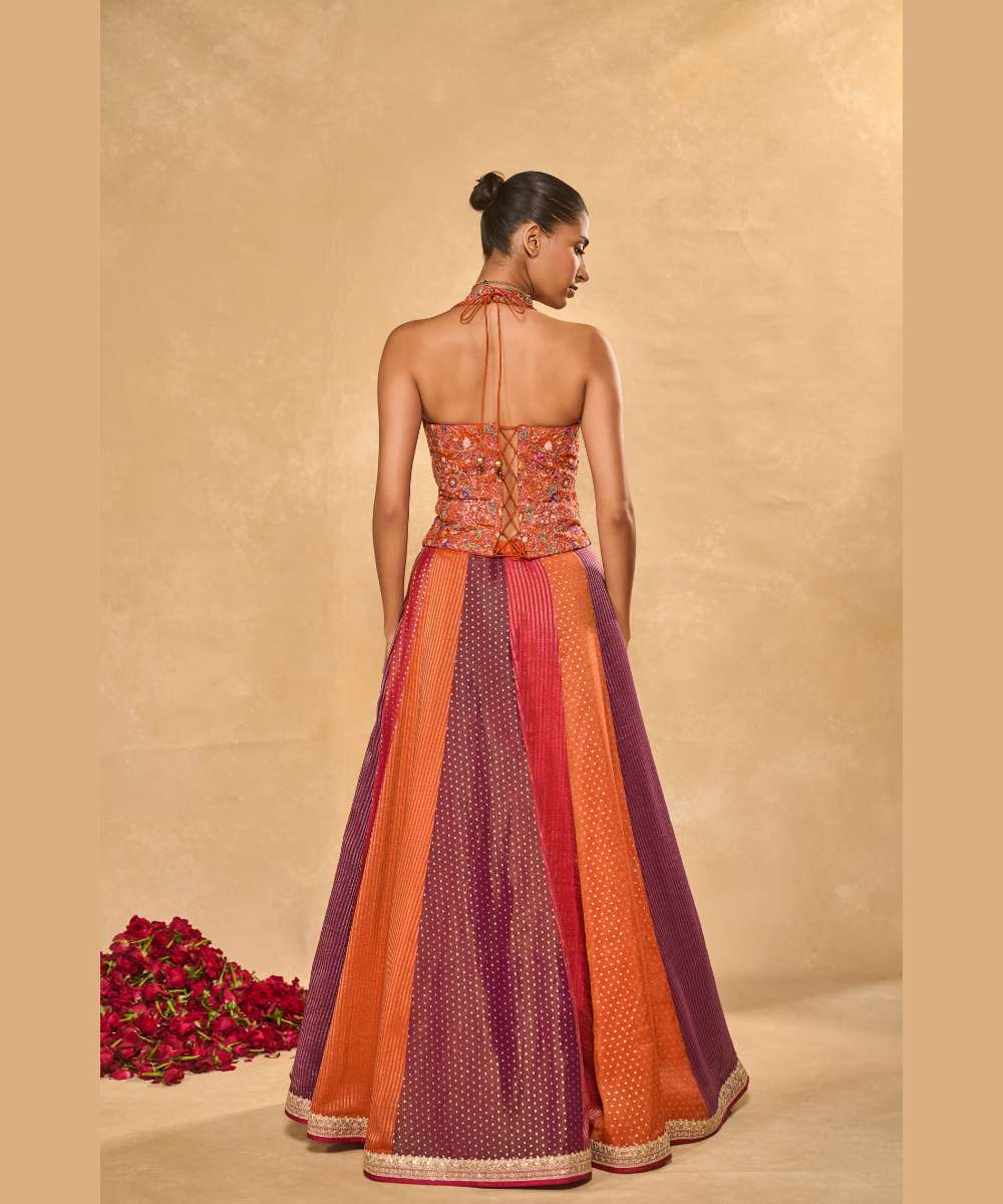 ASMA LEHENGA - Multicolor tissue jamewar lehenga paired with a delicately embroidered soft silk halter corset -Leher by Chamee and Palak