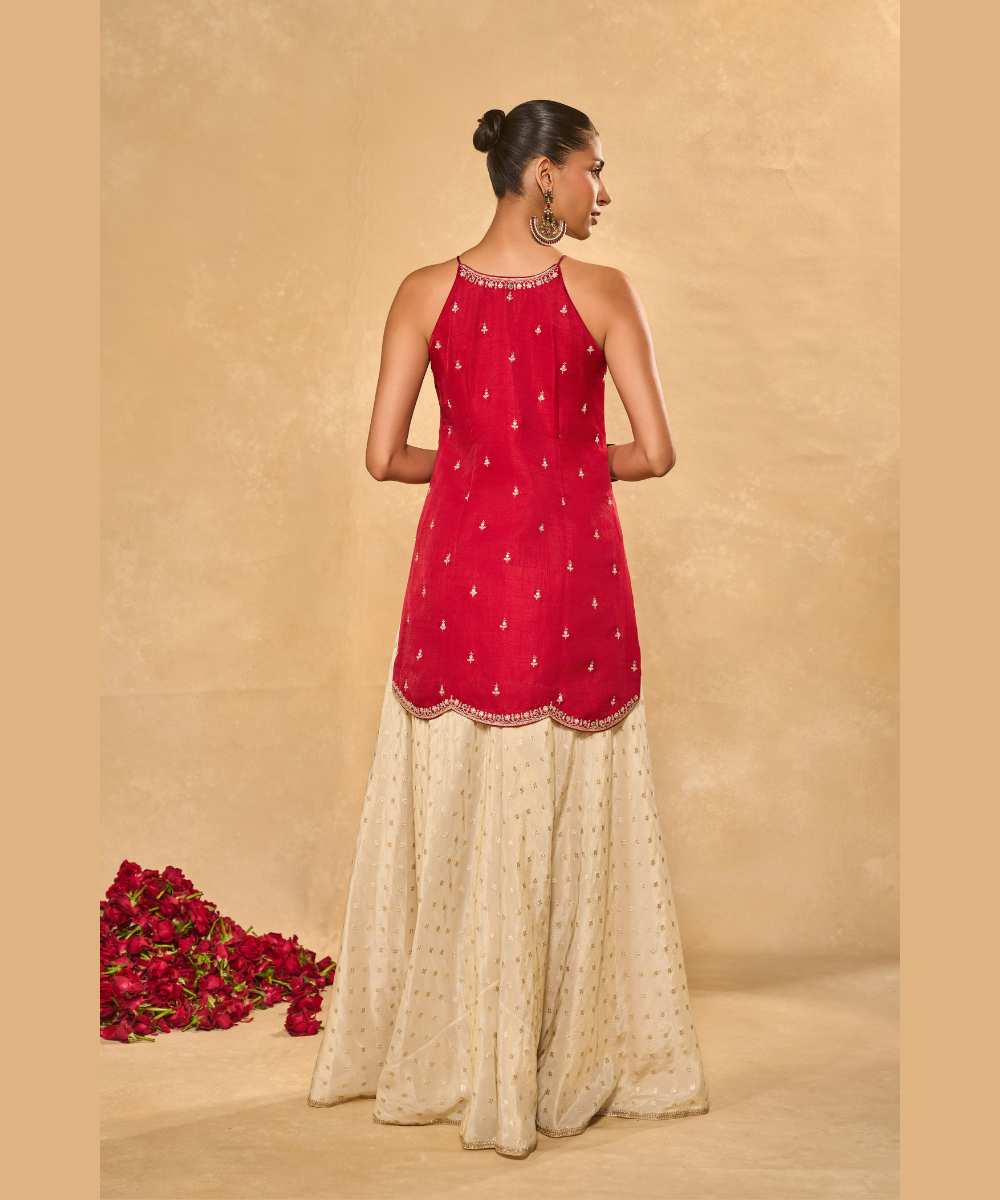AMBI  SHARARA - Soft silk halter kurta paired with an ivory tissue Jamawar flared pant - Leher by Chamee and Palak