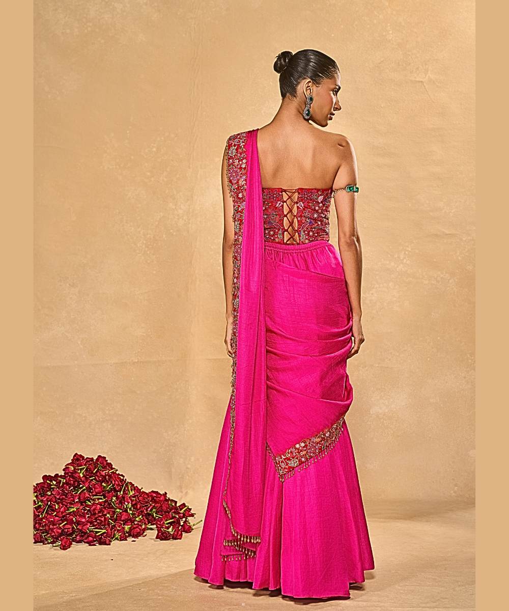 ARYA SAREE - Hot pink soft silk pre-draped saree paired with a red raw silk corset -  Leher by Chamee and Palak