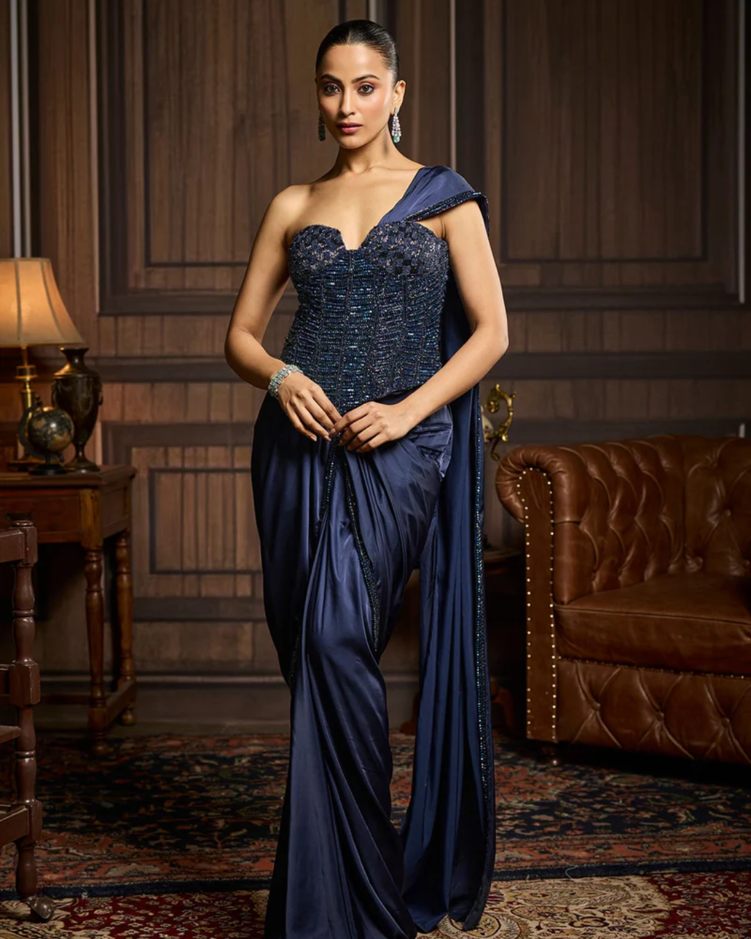Diya Rajvvir - Midnight Blue Embellished Corset And Solid Draped Dhoti Saree Set from Taara
