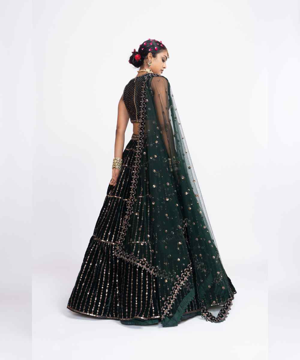 Deep green full tier lehenga set
