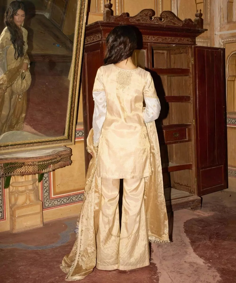 Aditi Gupta - Champagne Gold short Kurta with Bell Bottom Pants with Hot pink dupatta