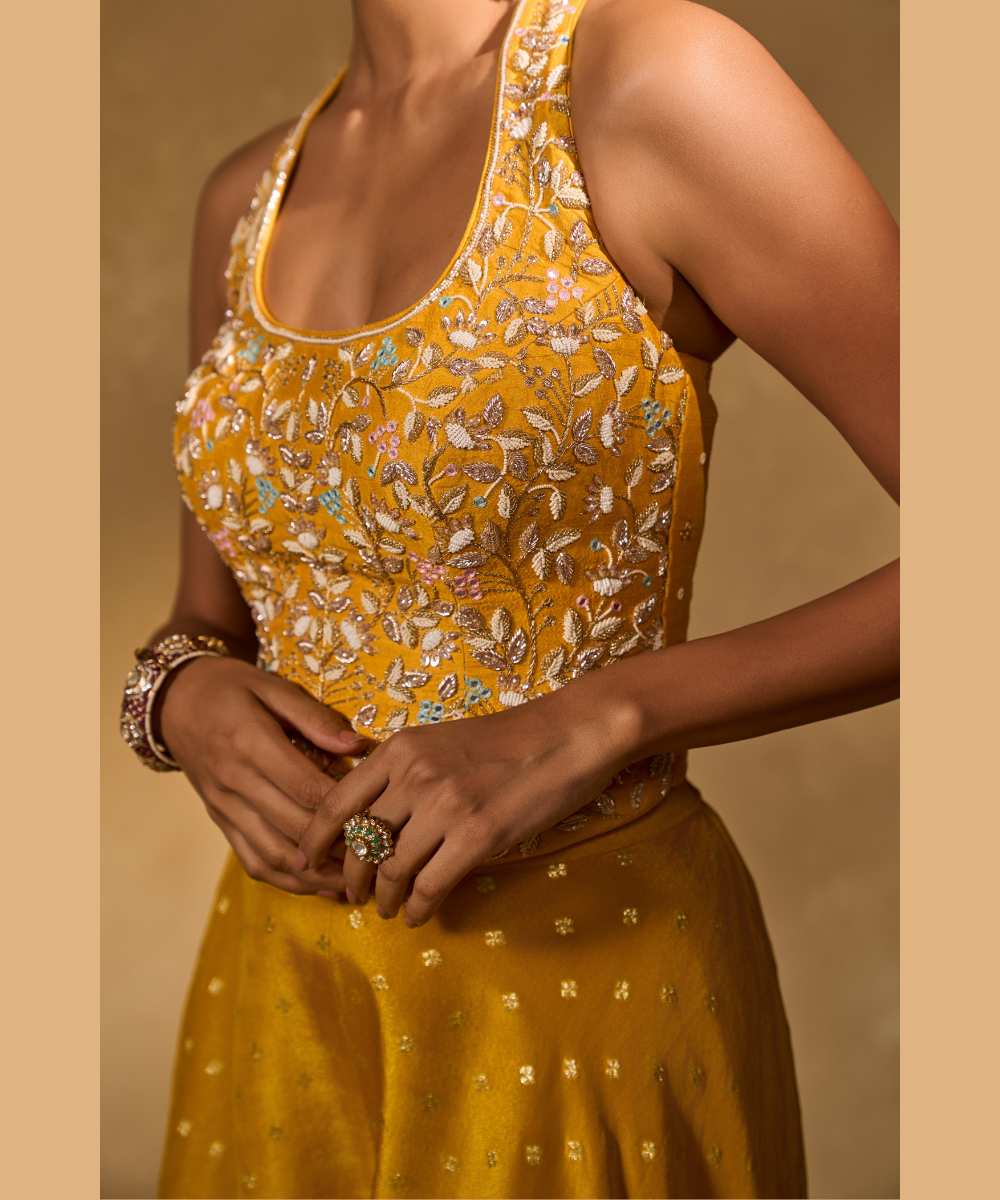 RIZ WITH TISSUE PANTS - Woven flared pant paired with a raw silk halter corset blouse -  Leher by Chamee and Palak