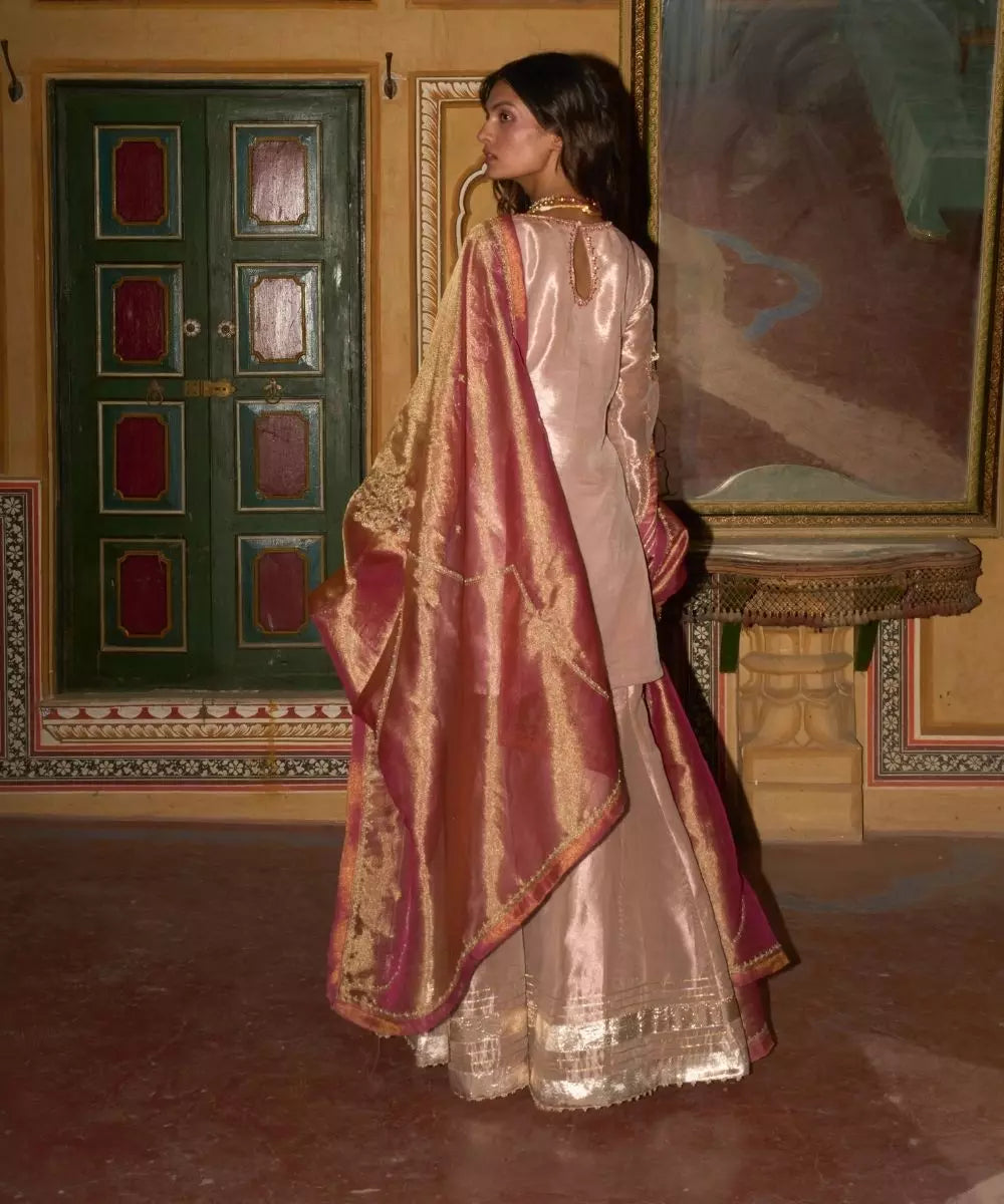 Aditi Gupta - Rose Gold short Kurta with Sharara and Hot pink dupatta in silk zari  tissue