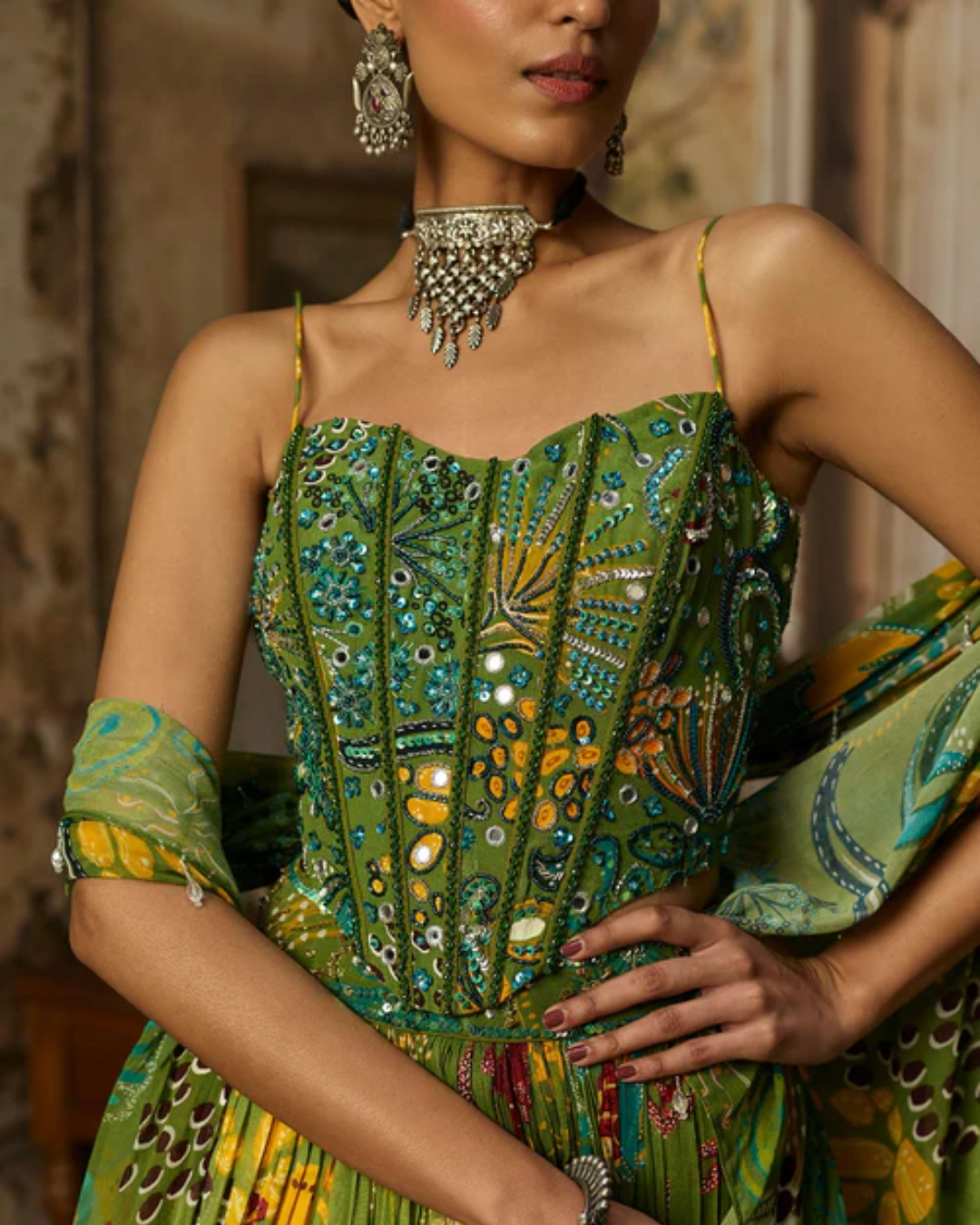 Diya Rajvvir - Pear Green Printed And Highlighted Corset Lehenga Set from Bahaar