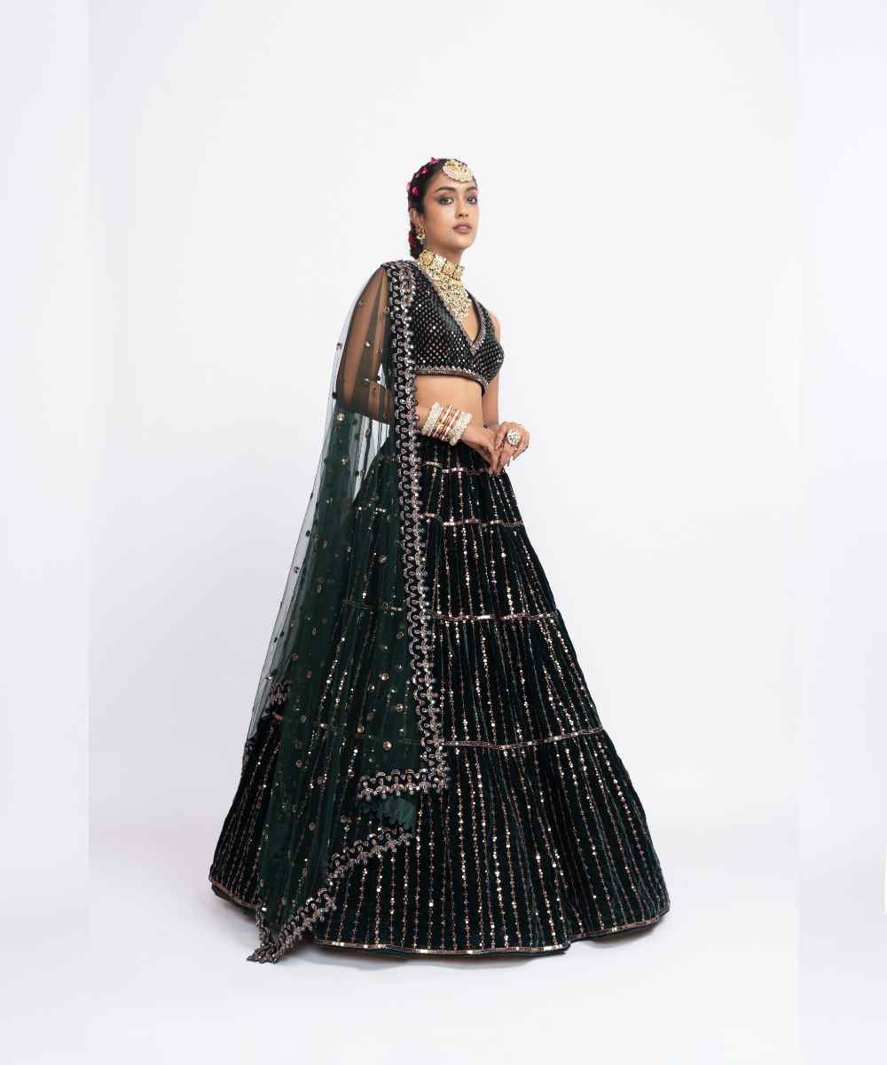Deep green full tier lehenga set
