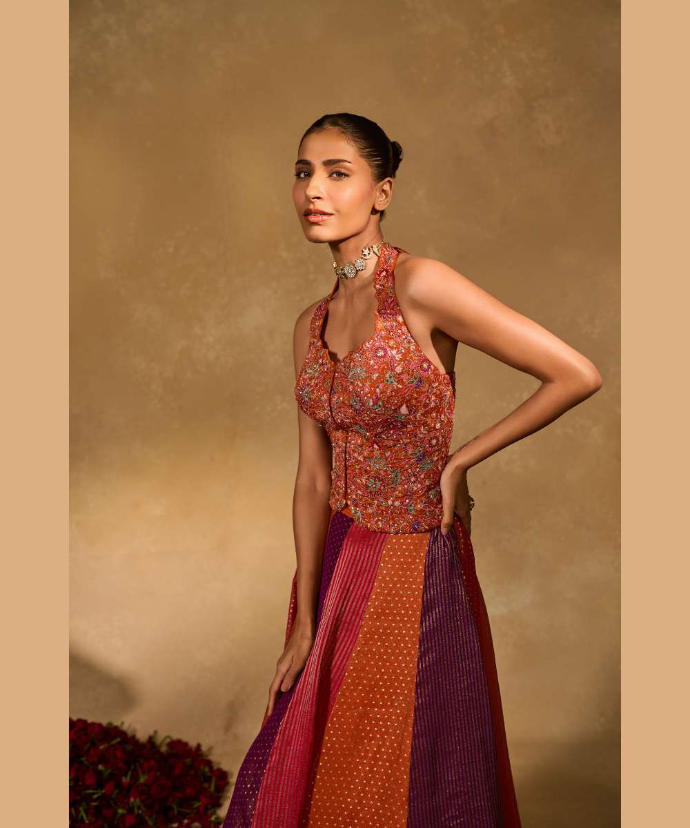 ASMA LEHENGA - Multicolor tissue jamewar lehenga paired with a delicately embroidered soft silk halter corset -Leher by Chamee and Palak