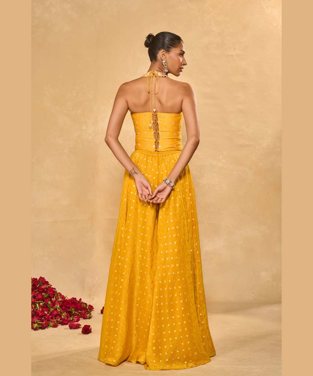 RIZ WITH TISSUE PANTS - Woven flared pant paired with a raw silk halter corset blouse -  Leher by Chamee and Palak