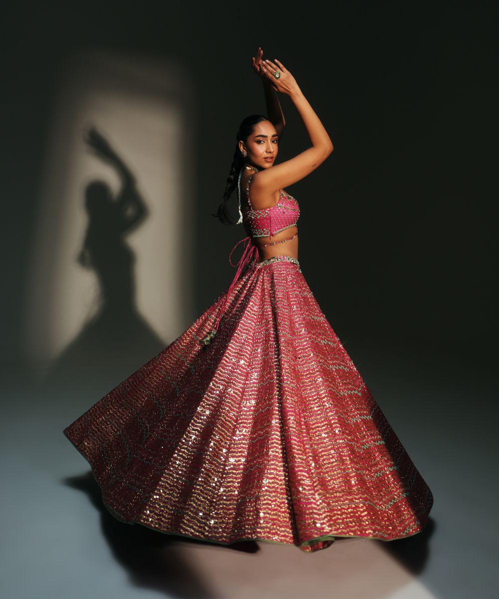 KOMAL- HEAVY HAND EMBROIDERED RANI PINK KALI LEHENGA - Mehfil by Mahima Mahajan