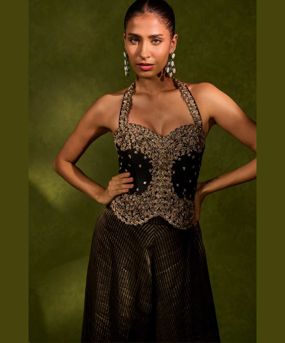 NAINA WITH FLARED PANTS - Tissue jamewar flared pants paired with a statement halter blouse - Leher by Chamee and Palak
