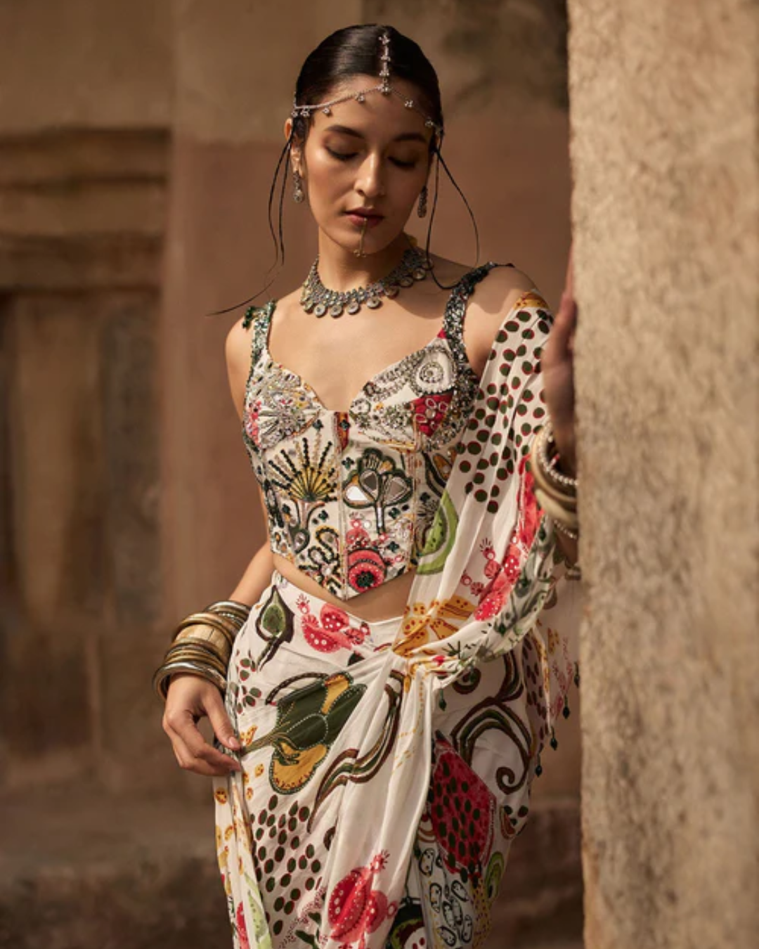 Diya Rajvvir - Ivory Print And Highlighted Corset With Dhoti Skirt Saree Set from Bahaar
