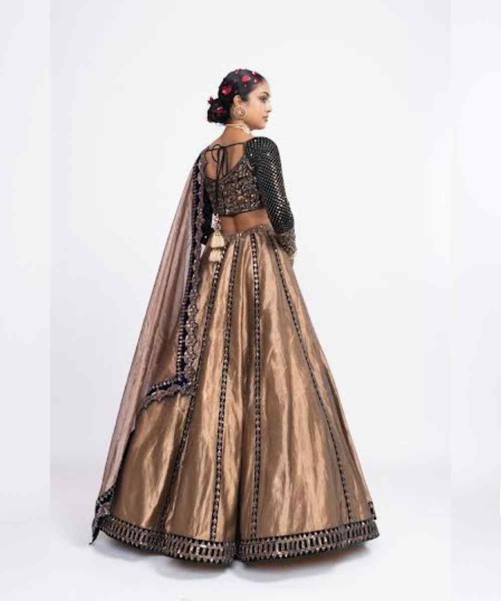 Deep green copper tissue lehenga set