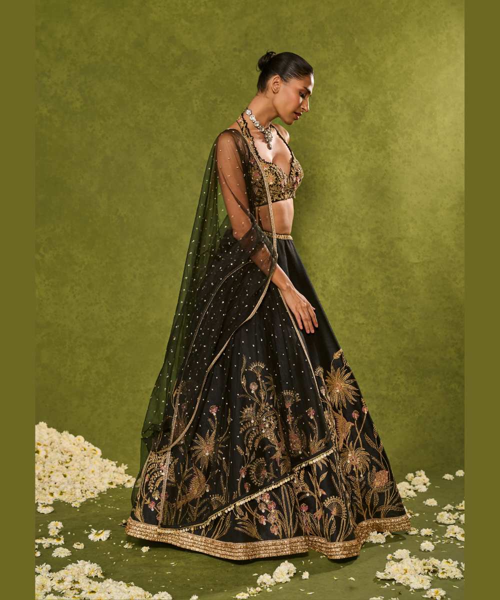 HUDA LEHENGA - Black dupion silk lehenga brought to life with forest-inspired motifs, intricately embroidered in zari, sequence, resham - Leher by Chamee and Palak