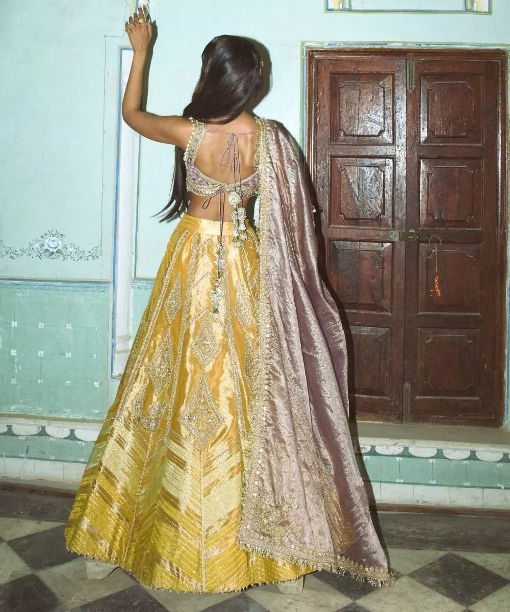 Aditi Gupta - Mustard Yellow Zari tissue with Lilac tissue dupatta Lehenga Set