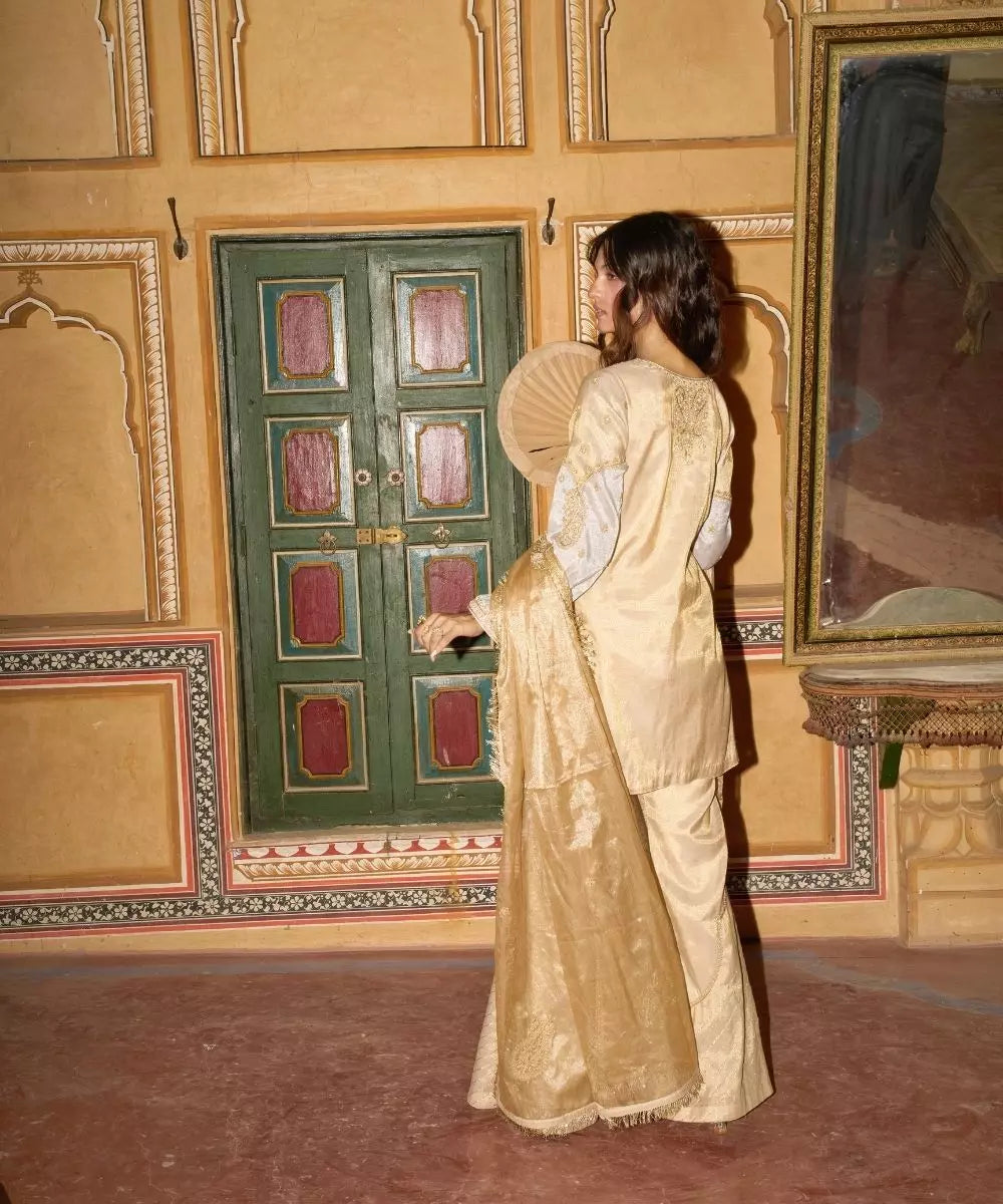 Aditi Gupta - Champagne Gold short Kurta with Bell Bottom Pants with Hot pink dupatta