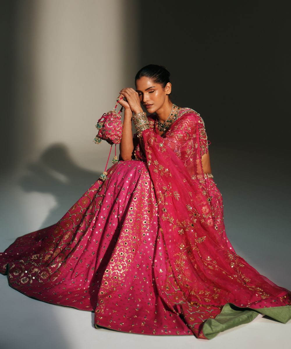 RANI PINK HAND EMBROIDERED POTLI BAG - Mehfil by Mahima Mahajan