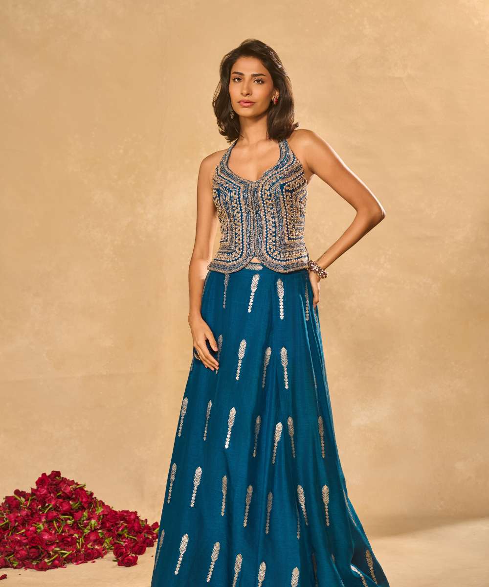 AMAL LEHENGA IN BLUE - Jamewar Lehenga with woven buttis paired with zari, sequence and zardozi embroidered halter neck blouse - Leher by Chamee and palak