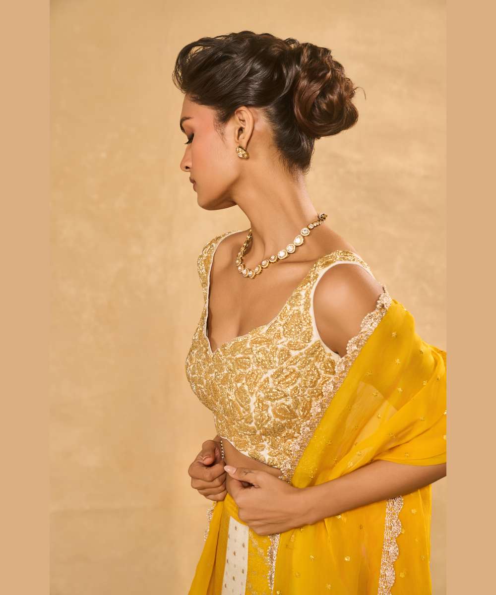 BHUMI LEHENGA - Ivory and yellow tissue jamewar lehenga with yellow organza dupatta encrusted with shimmering sequence -  Leher by Chamee and Palak