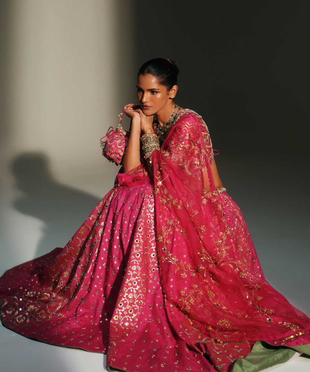 RANI PINK HAND EMBROIDERED POTLI BAG - Mehfil by Mahima Mahajan