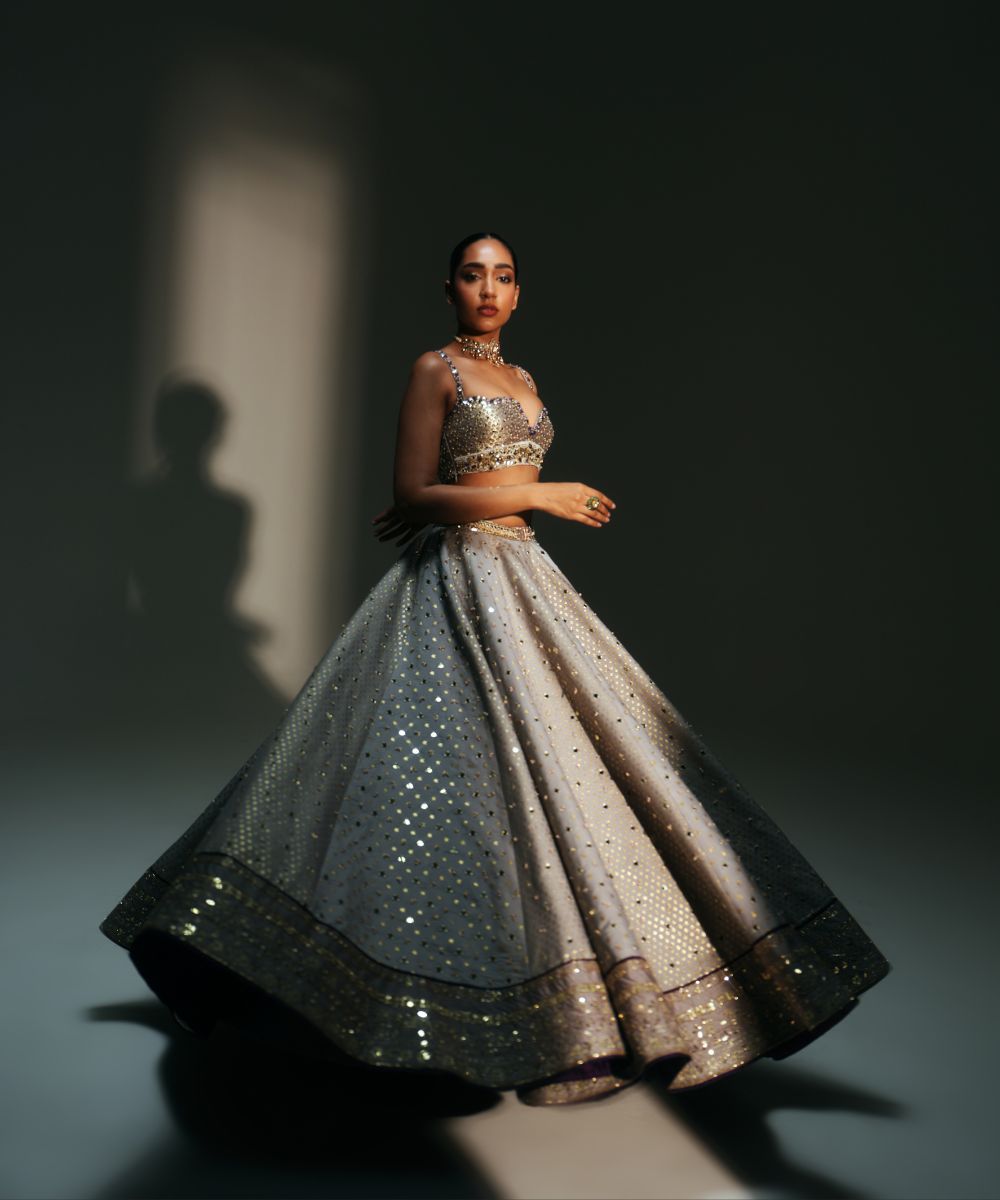 LEELA - HEAVY HAND EMBROIDERED KALI LEHENGA WITH BRALETTE WITH CRIS-CROSS DEATILING AT THE BACK AND CONTRAST DUPATTA - Mehfil by Mahima Mahajan