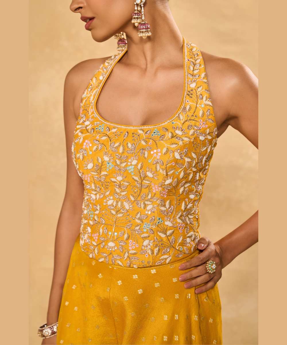 RIZ WITH TISSUE PANTS - Woven flared pant paired with a raw silk halter corset blouse -  Leher by Chamee and Palak