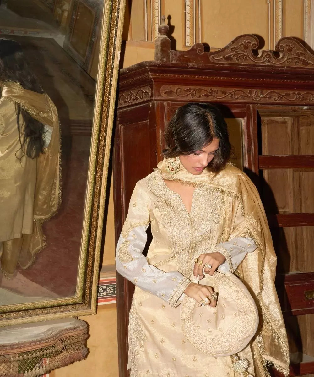 Aditi Gupta - Champagne Gold short Kurta with Bell Bottom Pants with Hot pink dupatta