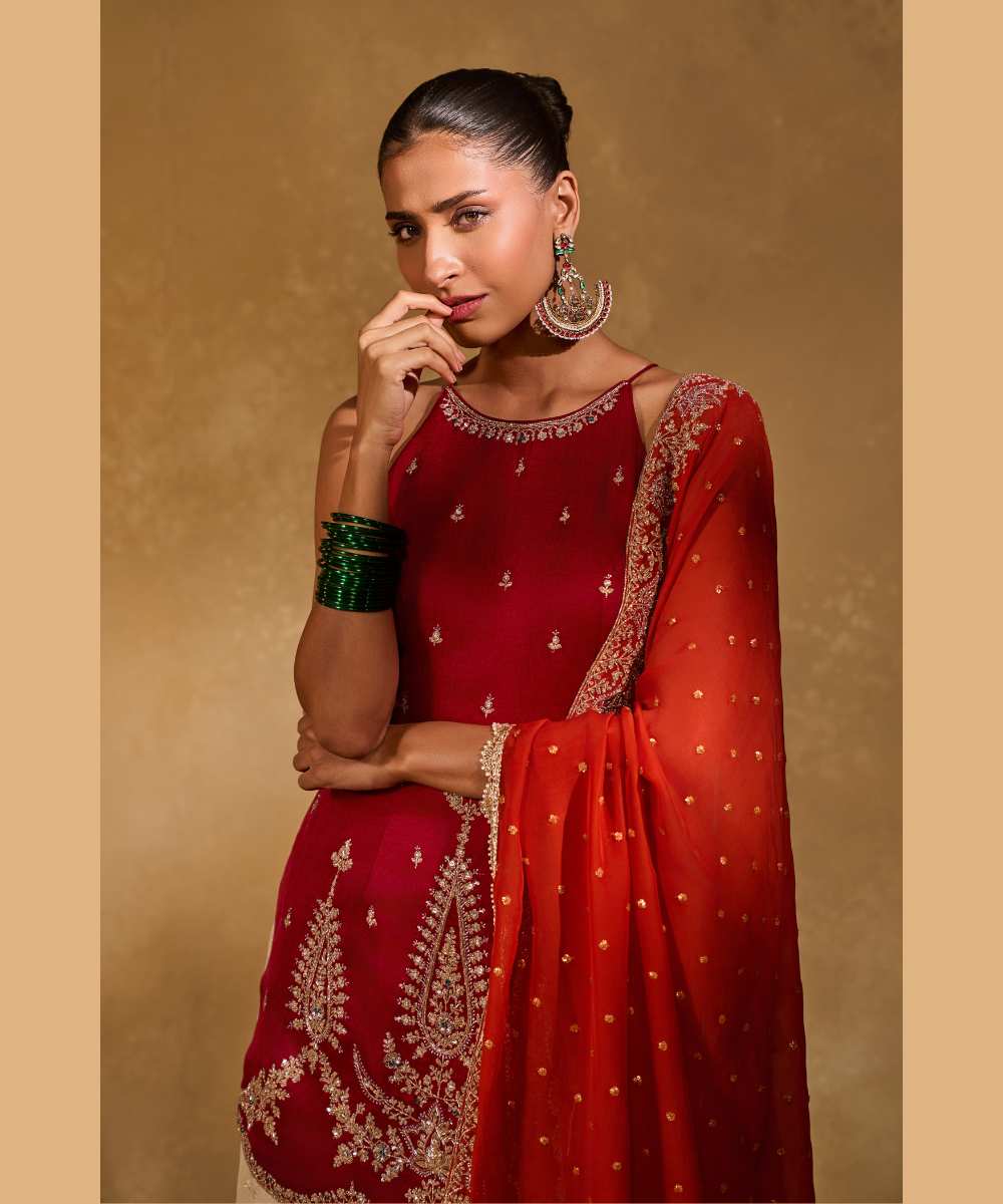 AMBI  SHARARA - Soft silk halter kurta paired with an ivory tissue Jamawar flared pant - Leher by Chamee and Palak