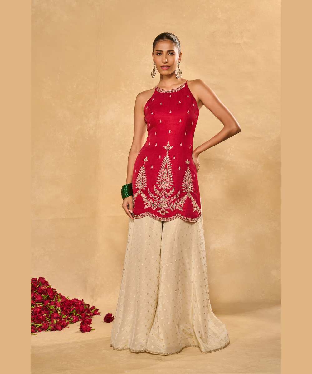 AMBI  SHARARA - Soft silk halter kurta paired with an ivory tissue Jamawar flared pant - Leher by Chamee and Palak