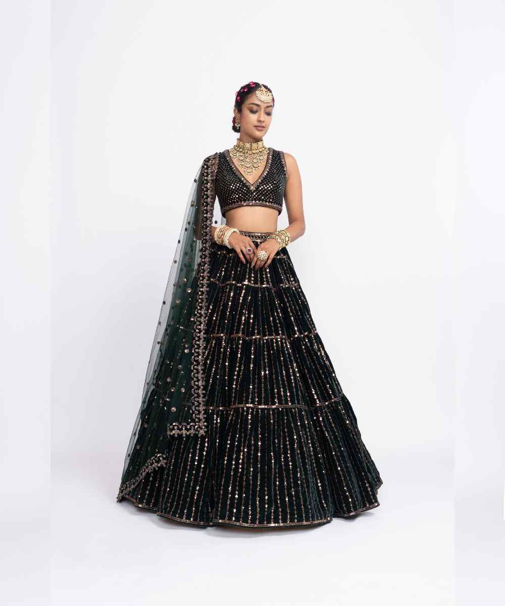 Deep green full tier lehenga set
