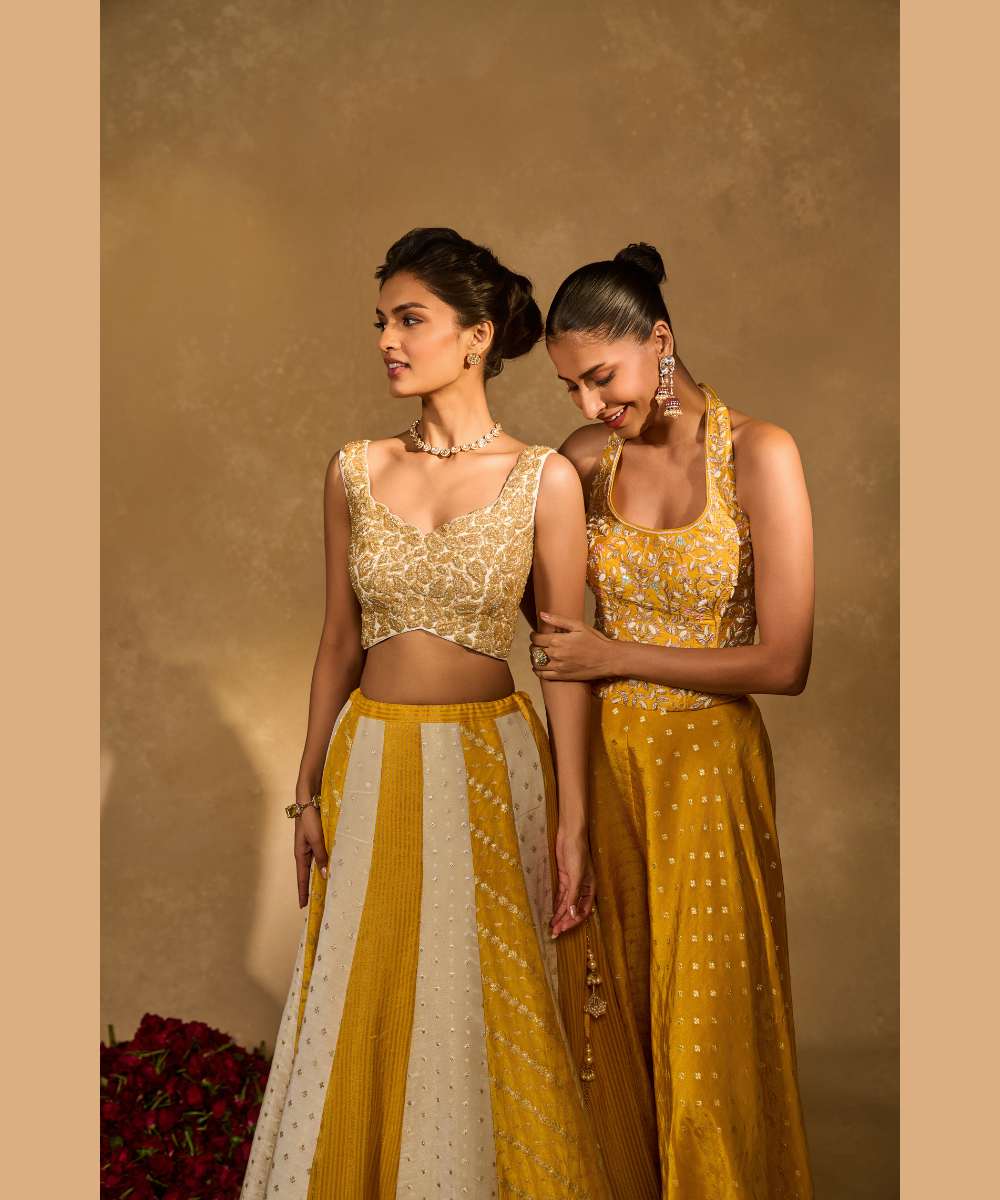 BHUMI LEHENGA - Ivory and yellow tissue jamewar lehenga with yellow organza dupatta encrusted with shimmering sequence -  Leher by Chamee and Palak