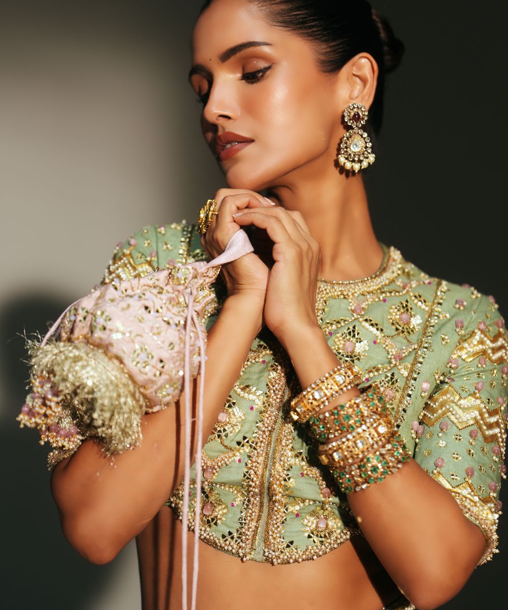 JIYA - HEAVY HAND EMBROIDERED PISTA GREEN KALI LEHENGA - Mehfil by Mahima Mahajan