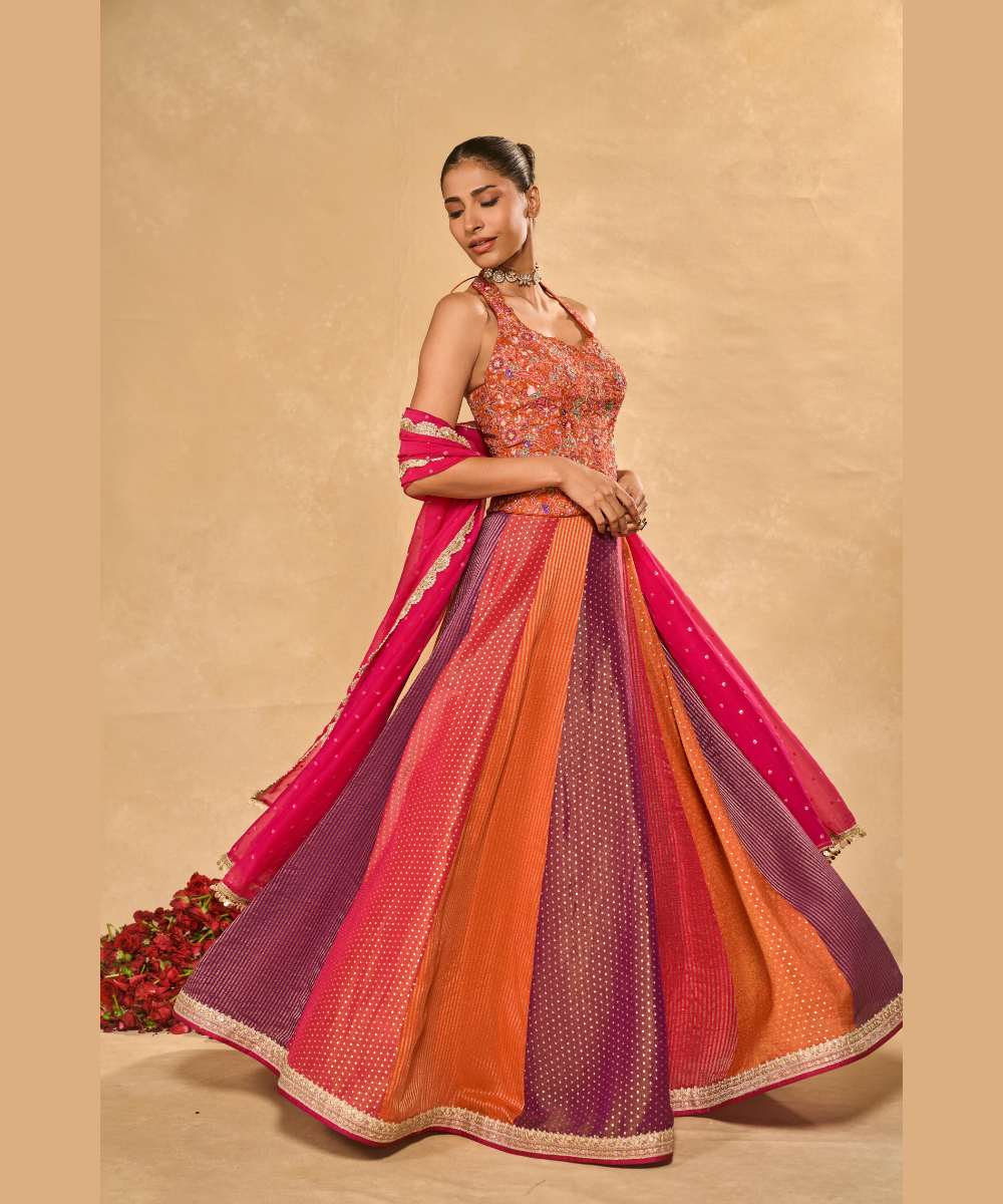 ASMA LEHENGA - Multicolor tissue jamewar lehenga paired with a delicately embroidered soft silk halter corset -Leher by Chamee and Palak