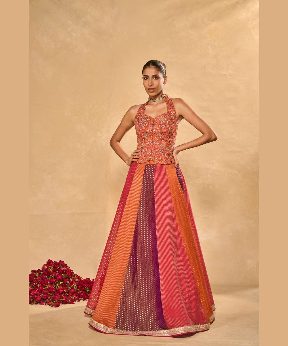 ASMA LEHENGA - Multicolor tissue jamewar lehenga paired with a delicately embroidered soft silk halter corset -Leher by Chamee and Palak